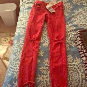 Ripped red skinnies size 34 or 2